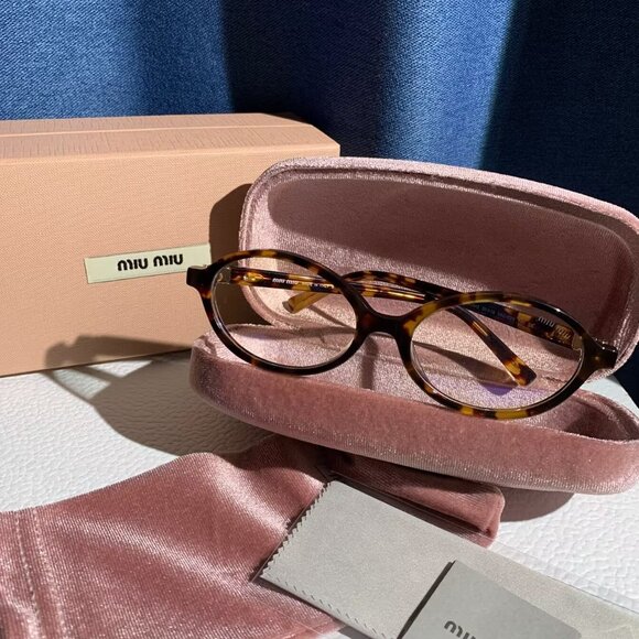 Miu Miu Black Oval Sunglasses w/ Gold Logo • Statement Luxe Vibes